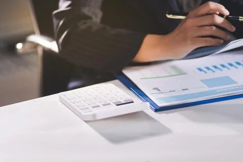 Accountants processing financial documents and taxes, managing corporate fi.. Stock Photos