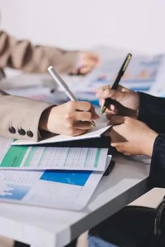 Accountants processing financial documents and taxes, managing corporate fi.. Stock Photos