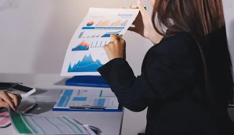 Accountants processing financial documents and taxes, managing corporate fi.. Stock Photos