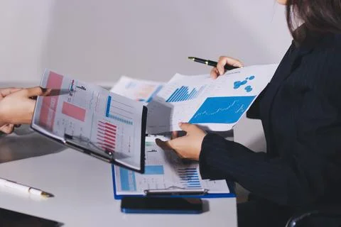 Accountants processing financial documents and taxes, managing corporate fi.. Stock Photos