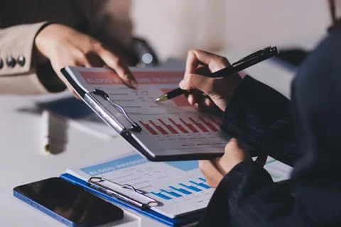 Accountants processing financial documents and taxes, managing corporate fi.. Stock Photos