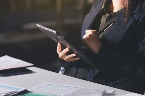 Accountants processing financial documents and taxes, managing corporate fi.. Stock Photos