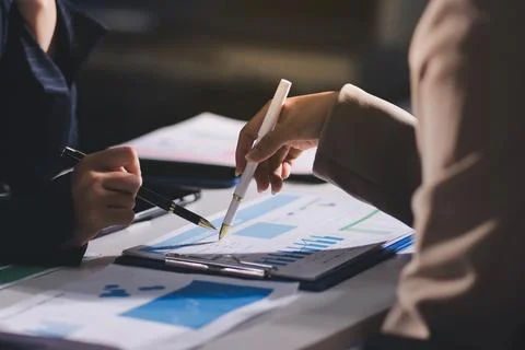 Accountants processing financial documents and taxes, managing corporate fi.. Stock Photos