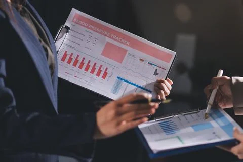 Accountants processing financial documents and taxes, managing corporate fi.. Stock Photos