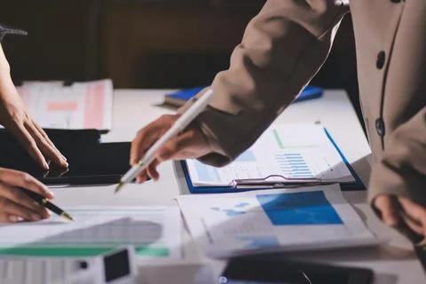 Accountants processing financial documents and taxes, managing corporate fi.. Stock Photos