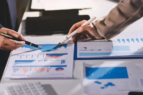 Accountants processing financial documents and taxes, managing corporate fi.. Stock Photos