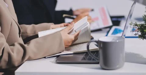 Accountants processing financial documents and taxes, managing corporate fi.. Stock Photos
