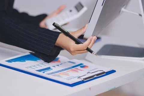 Accountants processing financial documents and taxes, managing corporate fi.. Stock Photos