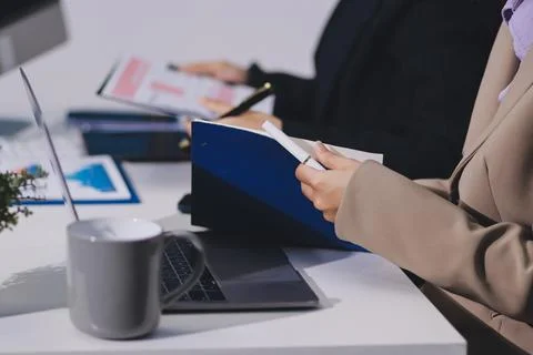 Accountants processing financial documents and taxes, managing corporate fi.. Stock Photos