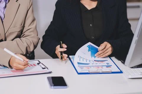 Accountants processing financial documents and taxes, managing corporate fi.. Stock Photos