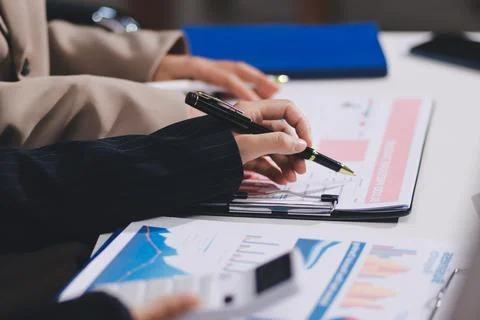 Accountants processing financial documents and taxes, managing corporate fi.. Stock Photos