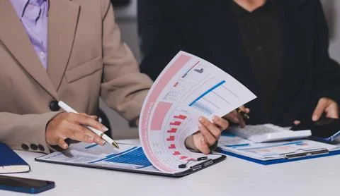 Accountants processing financial documents and taxes, managing corporate fi.. Stock Photos
