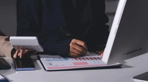 Accountants processing financial documents and taxes, managing corporate fi.. Stock Photos