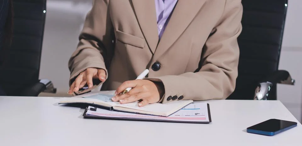 Accountants processing financial documents and taxes, managing corporate fi.. Stock Photos