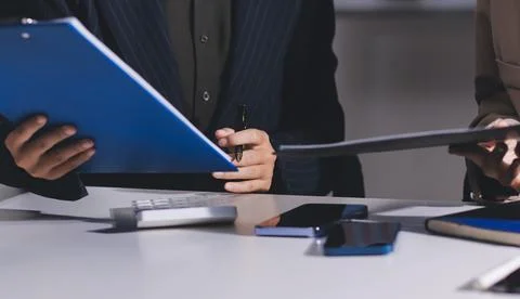 Accountants processing financial documents and taxes, managing corporate fi.. Stock Photos
