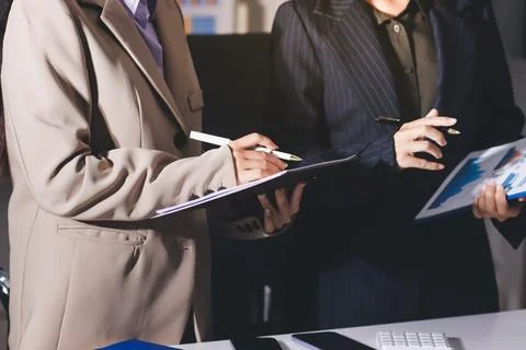 Accountants processing financial documents and taxes, managing corporate fi.. Stock Photos