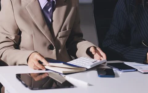 Accountants processing financial documents and taxes, managing corporate fi.. Stock Photos