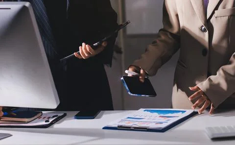 Accountants processing financial documents and taxes, managing corporate fi.. Stock Photos
