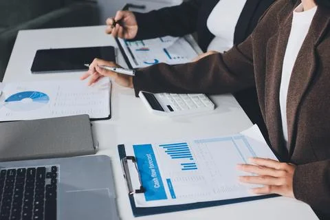 Accountants processing financial documents and taxes, managing corporate fi.. Stock Photos