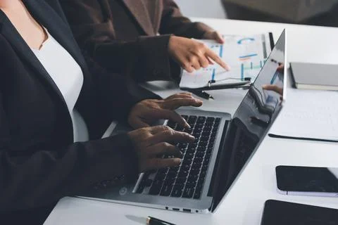 Accountants processing financial documents and taxes, managing corporate fi.. Stock Photos