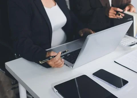 Accountants processing financial documents and taxes, managing corporate fi.. Stock Photos