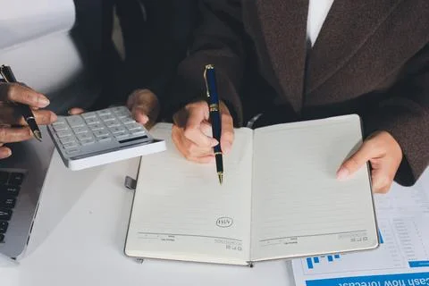 Accountants processing financial documents and taxes, managing corporate fi.. Stock Photos