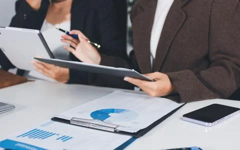 Accountants processing financial documents and taxes, managing corporate fi.. Stock Photos