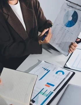 Accountants processing financial documents and taxes, managing corporate fi.. Stock Photos