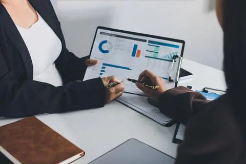 Accountants processing financial documents and taxes, managing corporate fi.. Stock Photos