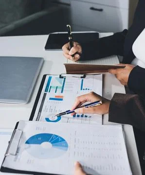 Accountants processing financial documents and taxes, managing corporate fi.. Stock Photos