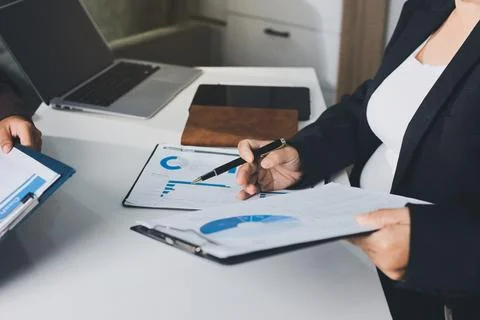 Accountants processing financial documents and taxes, managing corporate fi.. Stock Photos