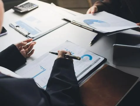 Accountants processing financial documents and taxes, managing corporate fi.. Stock Photos
