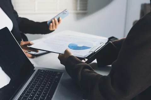 Accountants processing financial documents and taxes, managing corporate fi.. Stock Photos