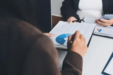 Accountants processing financial documents and taxes, managing corporate fi.. Stock Photos