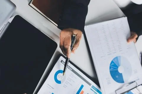 Accountants processing financial documents and taxes, managing corporate fi.. Stock Photos
