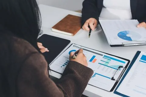 Accountants processing financial documents and taxes, managing corporate fi.. Stock Photos