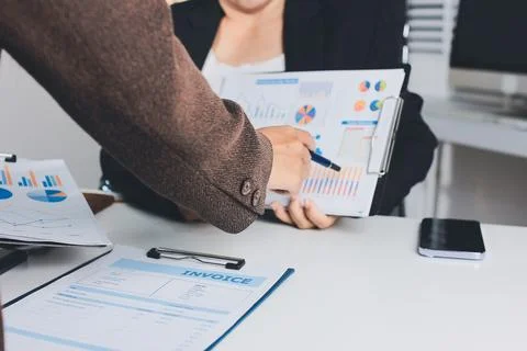 Accountants processing financial documents and taxes, managing corporate fi.. Stock Photos