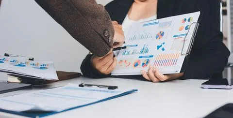 Accountants processing financial documents and taxes, managing corporate fi.. Stock Photos