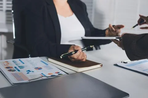 Accountants processing financial documents and taxes, managing corporate fi.. Stock Photos