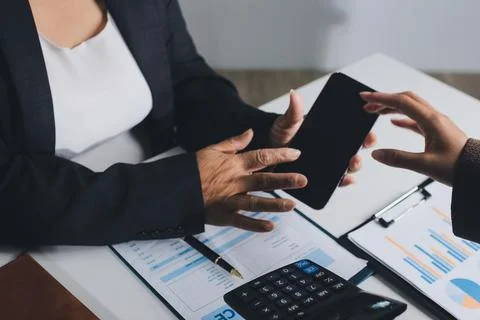 Accountants processing financial documents and taxes, managing corporate fi.. Stock Photos