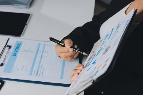 Accountants processing financial documents and taxes, managing corporate fi.. Stock Photos