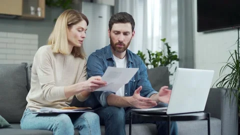 Accounting at Home Difficulties with entering data using Laptop computer  Stock Footage 231228009
