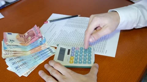 Accounting using calculator to control the petty cash Stock Footage 61952386