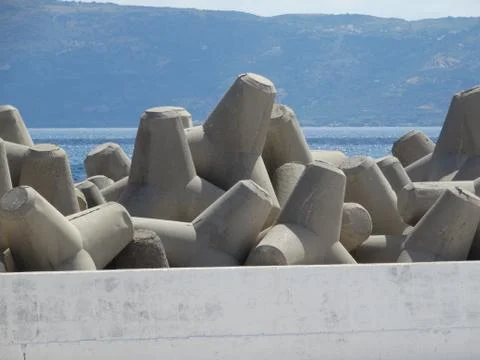 The accumulation of concrete breakwaters. Stock Photos