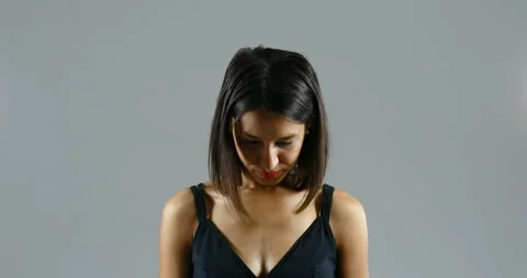 An accusing hand points to a woman's face, humiliating her Stock Footage 157266308