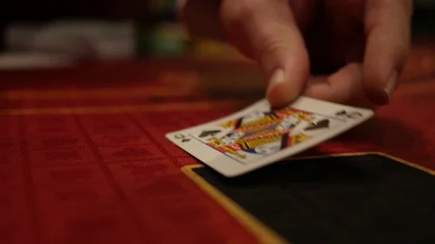 Ace and Queen being layed down on Black Jack Table Stock Footage 71114594
