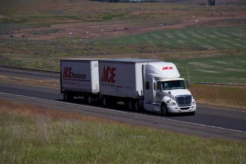 ACE Hardware - Double Trailer - White International Semi Stock Photos
