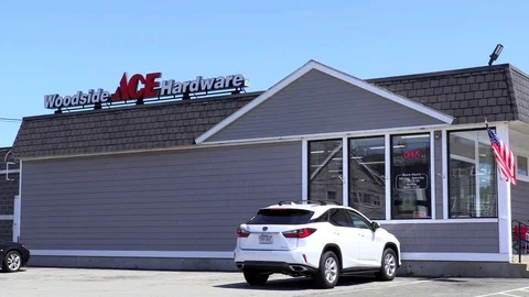 Ace Hardware retailer storefront, customer drive up parking Stock Footage 78332896