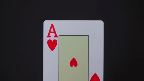 ACE of hearts is approaching on a black background Video stock 141030039