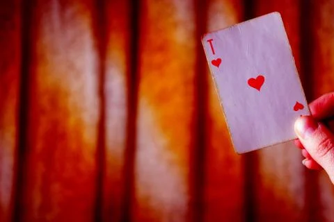 Ace of hearts being held Stock Photos